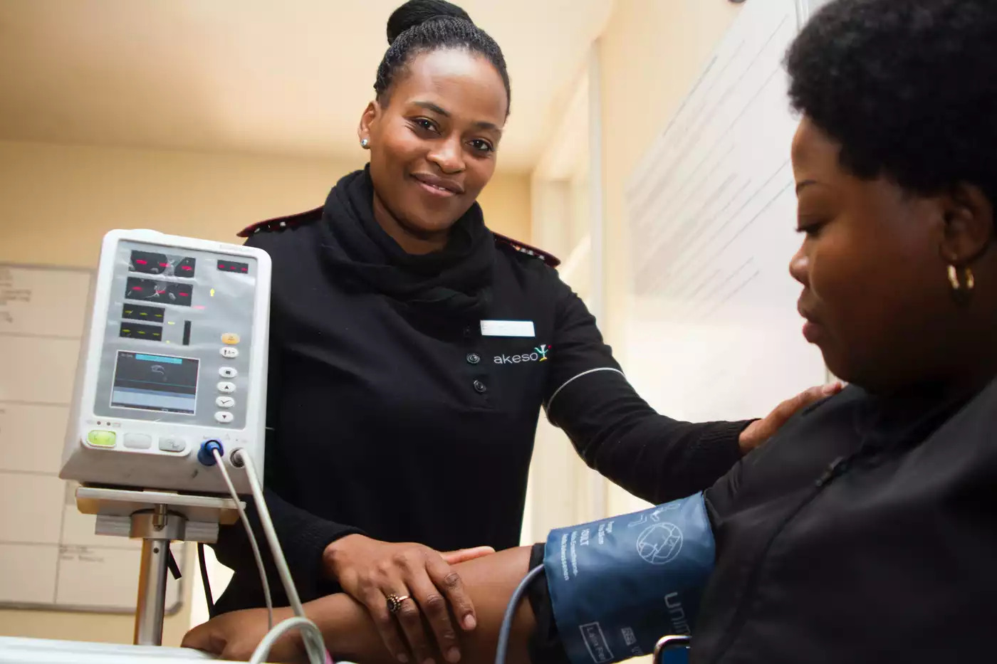 woman checking blood pressure