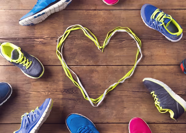 running shoes and heart in shoelaces