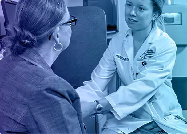 Patient consulting with doctor.