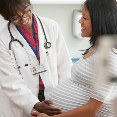 pregnant woman visiting doctor