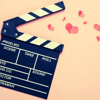 clapperboard with hearts