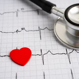 Stethoscope on top of EKG