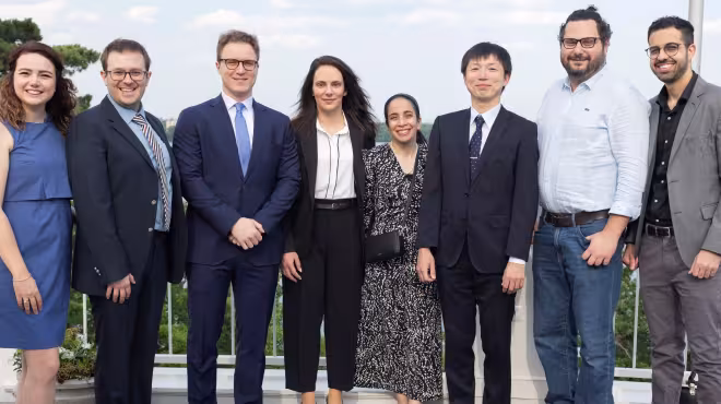 Photograph of 8 international scholars 