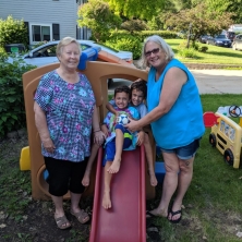Shelley-Peterson-on-right-with-two-grandkids-and-sister-Mer-768x1024.jpeg