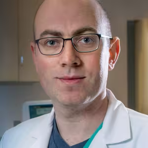 headshot of Dr. Toby Rogers