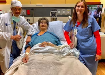 Dr. Sorajja and Kate Jappe with MHIF's 50th Triluminate patient