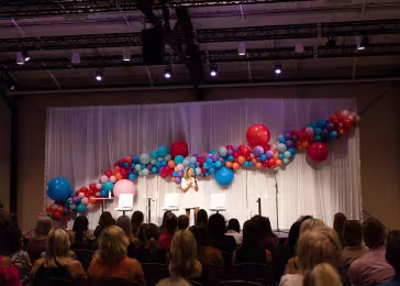 stage with baloons