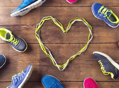 running shoes and heart in shoelaces