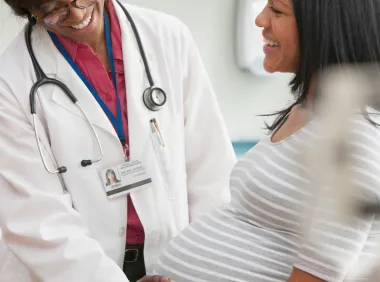 pregnant woman visiting doctor