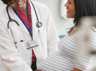 pregnant woman visiting doctor